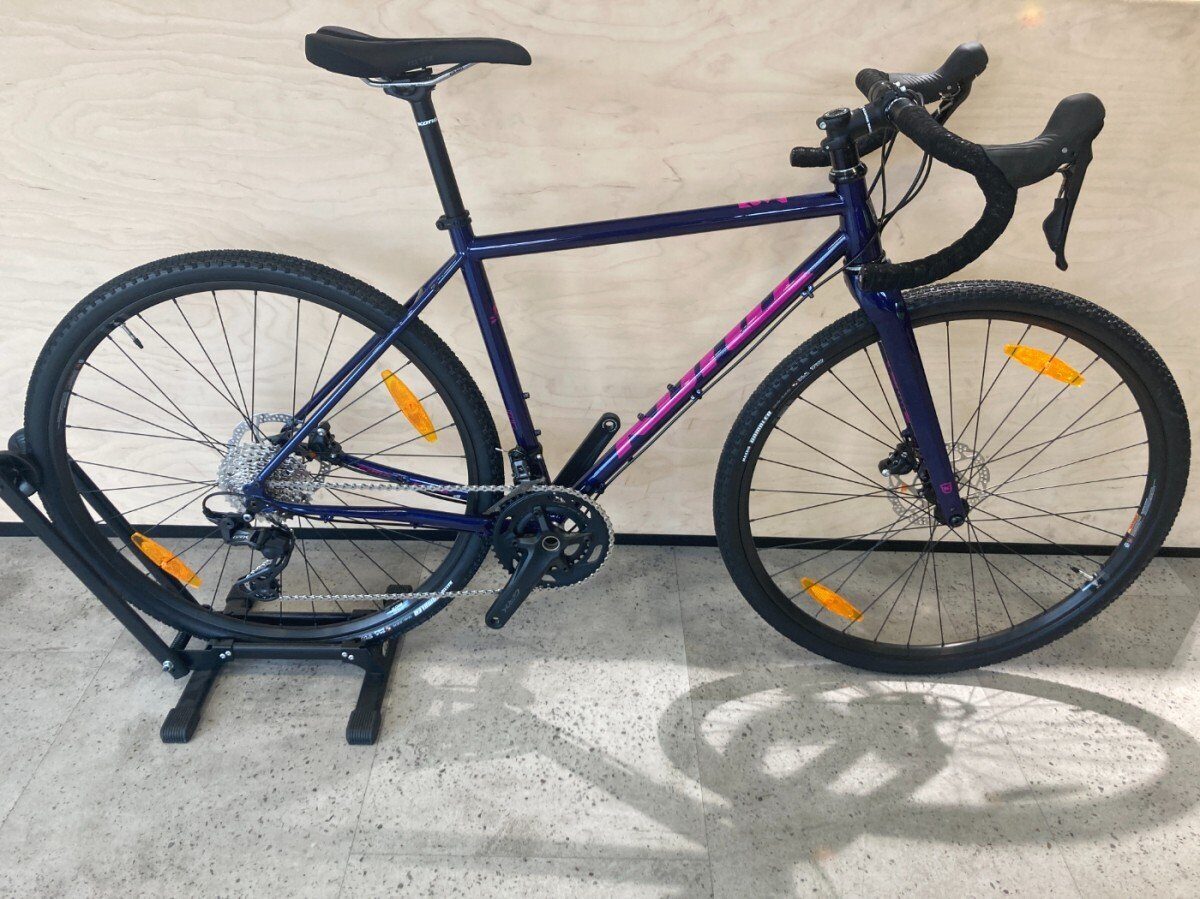 Kona Rove LTD Shimano (PROMO) 2025, Gloss Metallic Gentian Blue w/ Dark Orchid Decals